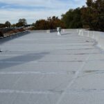 Full flat roof, chimney, and gutter residential restoration project