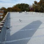 Full flat roof, chimney, and gutter residential restoration project