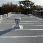 Full flat roof, chimney, and gutter residential restoration project