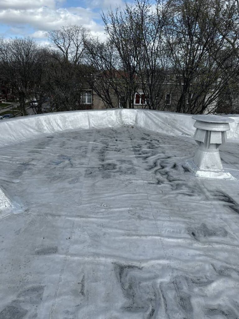 Full flat roof, chimney, and gutter residential restoration project