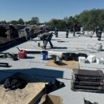 Full flat roof, chimney, and gutter residential restoration project